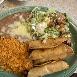 Dos Reales Mexican Restaurant - This is what I had. The chicken flautas. Rice, beans and salad all freshly cooked and the meat was excellent.