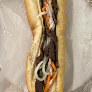 Saigon Noodles & Grill - 14. Vietnamese Style Grilled Beef Sandwich - Vietnamese Near Me - Arlington, Virginia Saigon Noodles & Grill - 14. Vietnamese Style Grilled Beef Sandwich - Vietnamese Near Me - Arlington, Virginia