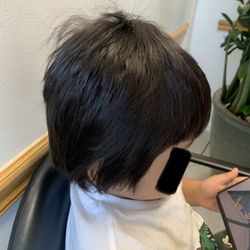 Longer from one side (not even).