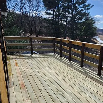 Tragers Seamless Gutters - Deck, floor, and rail replacement - Roofing Near Me - Elroy, Wisconsin Tragers Seamless Gutters - Deck, floor, and rail replacement - Roofing Near Me - Elroy, Wisconsin