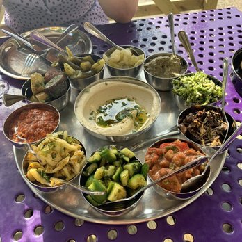 Laser Wolf - Please notice how perfectly my friend matched the table before looking at the food pic - Middle Eastern Near Me - Philadelphia, Pennsylvania