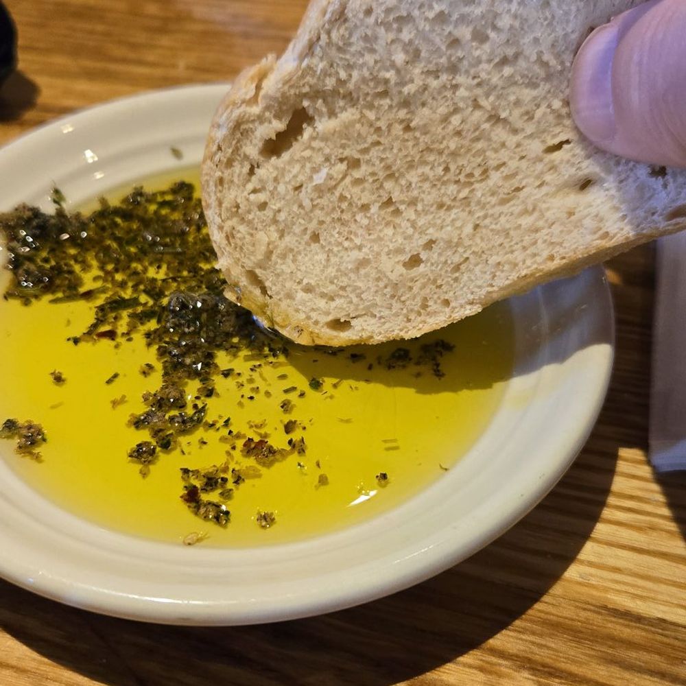 Carrabba's Italian Grill - Bread with dipping oil - Italian Near Me - Gainesville, Florida