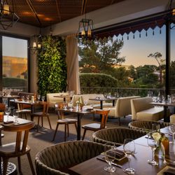 La Cave Wine & Food Hideaway - The Garden Room and terrace at first light. Photo: Shawn Talbot