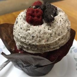 Red velvet traditional cupcake with cookies and cream icing