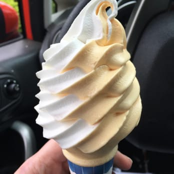 King Kone - a hand holding a cone of ice cream - Ice Cream & Frozen Yogurt Near Me - Merrimack, New Hampshire