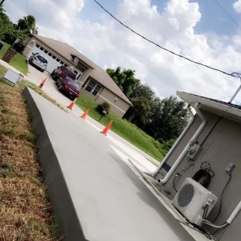 L M Thomas Cement Works - a concrete slab laying on the side of a house - General Contractors Near Me - Fort Myers, Florida L M Thomas Cement Works - a concrete slab laying on the side of a house - General Contractors Near Me - Fort Myers, Florida
