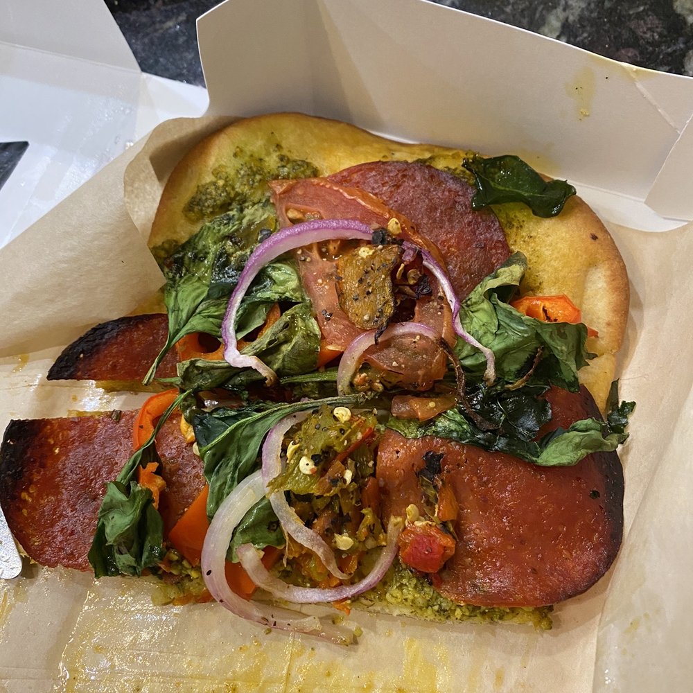 The Veg with pesto sauce and added pepperoni (half eaten). Yum! The Veg with pesto sauce and added pepperoni (half eaten). Yum!