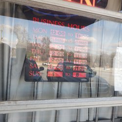 Peach Bowl Bowling Lanes - Hours, hard to read due to glare - my apologies