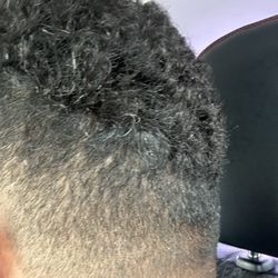 In The Cut Barbershop - The fade doesn't leave it clean behind the head.