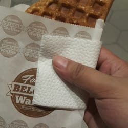 Famous Belgian Waffles - In my hand. A very good size for the price you pay.