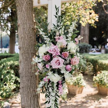 Brick by Brick Floral - Floral arrangement on arch - Florists Near Me - Vacaville, California