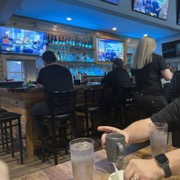 a man sitting at a bar