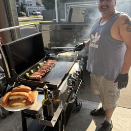 Cooking bacon wrapped hotdogs in my new griddle Cooking bacon wrapped hotdogs in my new griddle