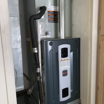 Yeti Air Conditioning - Closet mounted 80% efficient Trane furnace replacement - Heating & Air Conditioning/HVAC Near Me
