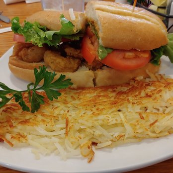 Grand Day Cafe - Shrimp po boy sandwhich with a side of hashbrowns - Breakfast & Brunch Near Me - Columbus, Ohio Grand Day Cafe - Shrimp po boy sandwhich with a side of hashbrowns - Breakfast & Brunch Near Me - Columbus, Ohio