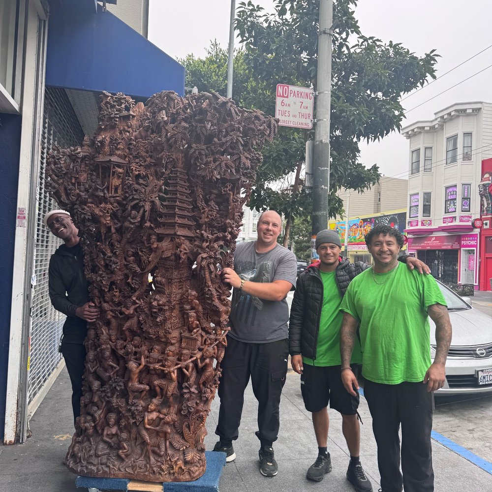 Tim Movers - The half ton statue is safely outside on the sidewalk, before loading it onto the moving truck - Movers Near Me - San Francisco, California Tim Movers - The half ton statue is safely outside on the sidewalk, before loading it onto the moving truck - Movers Near Me - San Francisco, California