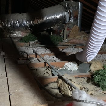 Attic Air - Improper bathroom exhaust vent (dryer vent ) and inadequate insulation prior to Attic Air coming in - An attic space with visible ductwork, insulation, and electrical wiring, indicating ongoing or incomplete installation or maintenance work. - Insulation Installation Near Me - St. Charles, Illinois