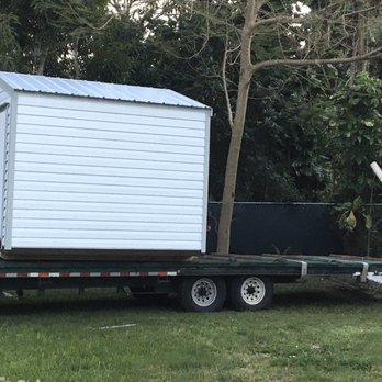 Shed Garage Door Services - Getting the shed off the back of the truck. - Garage Door Services Near Me - Pleasanton, Florida