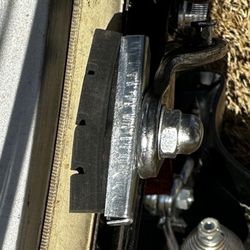 Bicycle Pedaler - The "mechanic" tried to push the rubber brake pad back in with his fingers but didn't get it fully re-seated.