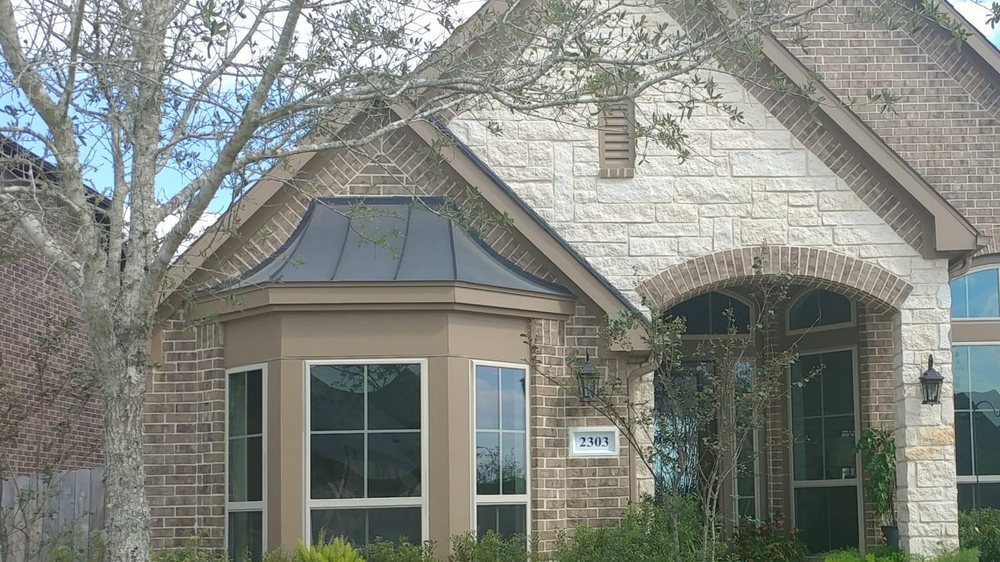 Slide of Tin Man Sheet Metal & Roofing