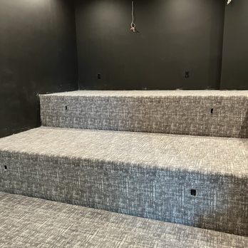 Vision Flooring - a set of stairs in a home theater - Flooring Near Me Vision Flooring - a set of stairs in a home theater - Flooring Near Me