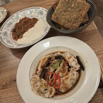 Kawa Ni - Szechuan pork dumplings and Mapo tofu (with fried wontons wrappers) - Izakaya Near Me - Denver, Colorado Kawa Ni - Szechuan pork dumplings and Mapo tofu (with fried wontons wrappers) - Izakaya Near Me - Denver, Colorado