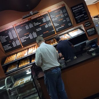 Kolache Stop - a man standing at the counter - Bakeries Near Me - San Antonio, Texas