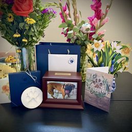 Daphnie's ashes, paw print, card and info from cremation