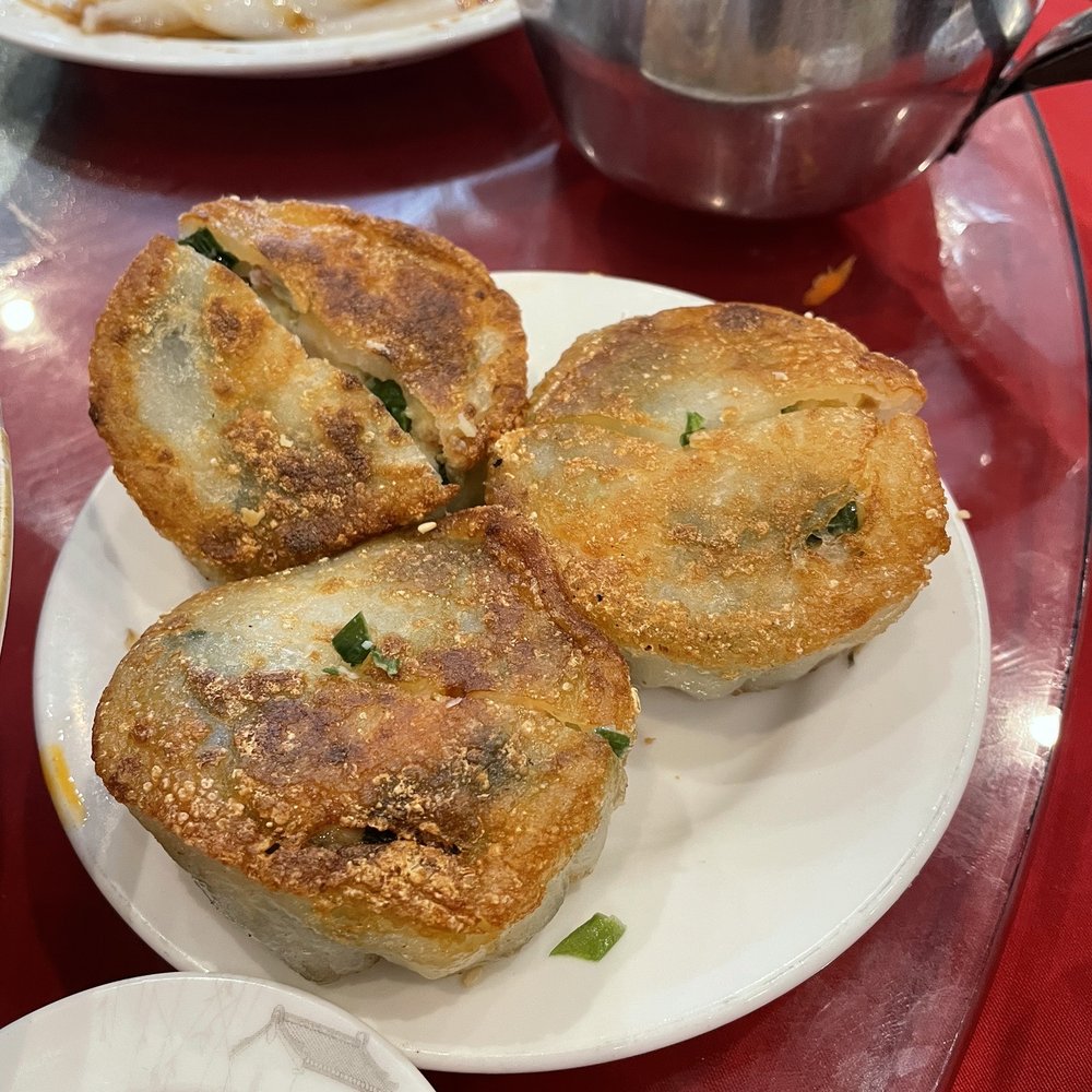 Orient Odyssey - Pan Fried Leek Dumpling - Cantonese Near Me - Jericho, New York Orient Odyssey - Pan Fried Leek Dumpling - Cantonese Near Me - Jericho, New York