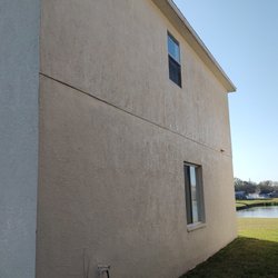 Affordable DH - Chlorine rinsed/pressure washed the side of a home!