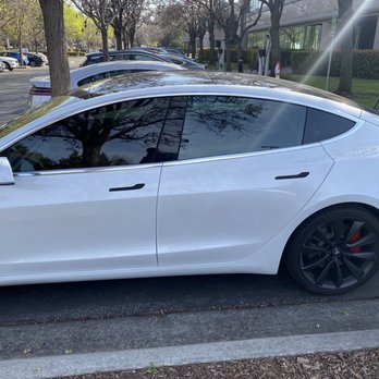 Tesla - New glass in the rear door. Note the tinted front and the non tinted rear door. - Car Dealers Near Me - Palo Alto, California Tesla - New glass in the rear door. Note the tinted front and the non tinted rear door. - Car Dealers Near Me - Palo Alto, California