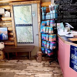 a dog sitting in front of the counter