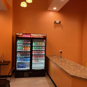 India Eats Restaurant - a refridgerator with soda and soft drinks - Indian Near Me - Atlanta, Georgia India Eats Restaurant - a refridgerator with soda and soft drinks - Indian Near Me - Atlanta, Georgia