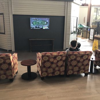 Radisson Hotel Lenexa Overland Park - Sitting area by coffee bar and pool - Hotels Near Me - Lenexa, Kansas Radisson Hotel Lenexa Overland Park - Sitting area by coffee bar and pool - Hotels Near Me - Lenexa, Kansas