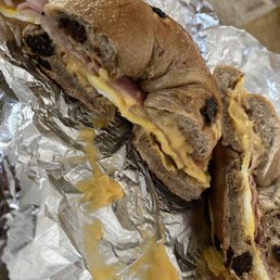 Ham, egg, and cheese on a cinnamon raisin bagel Ham, egg, and cheese on a cinnamon raisin bagel