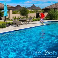 McCools Pools & Home Management - Beautiful day we love what we do Steve cleaning a pool in North Scottsdale