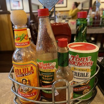 Cajun Kitchen Cafe - Sauces and seasoning at each table - Cajun/Creole Near Me - Lompoc, California