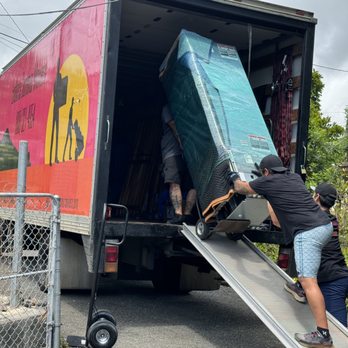 Endless Summer Movers - Expert team work moving a 500 lb fridge - Movers Near Me