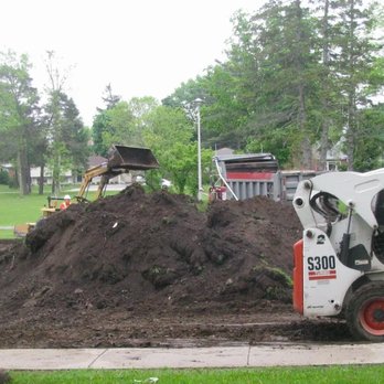 Jerry's Asphalt Paving - a man working on a pile of dirt - General Contractors Near Me - Ilderton, Ontario Jerry's Asphalt Paving - a man working on a pile of dirt - General Contractors Near Me - Ilderton, Ontario