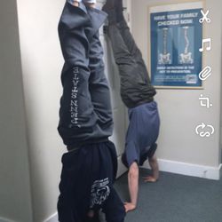 Advantage Chiropratic - Daughter & Dr Brenner doing handstands together 2 days after she sprained her elbow