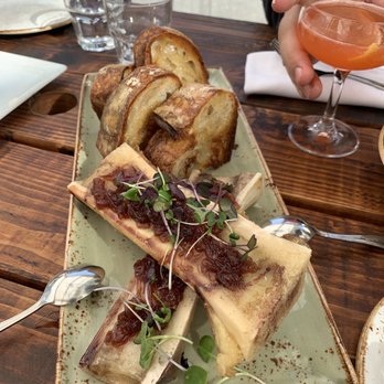 How to Cook a Wolf - Bone Marrow with shallot jam and sourdough bread - Italian Near Me - Seattle, Washington How to Cook a Wolf - Bone Marrow with shallot jam and sourdough bread - Italian Near Me - Seattle, Washington