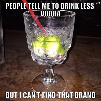 Alibi - a glass of water with limes in it - Dive Bars Near Me - Brooklyn, New York