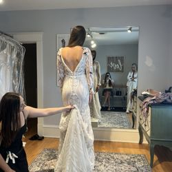 Wedding Shoppe - Showing different bustle options and alterations to lower the back if wanted