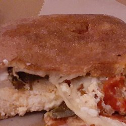 Angelina's Pizzeria - Top of calzone a bit deceptive if you see the bottom. Fillings were satisfying and delicious