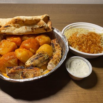 Mr. Greek - a plate of food and a bowl of rice - Greek Near Me - Aurora, Ontario