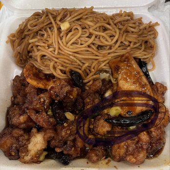 Bamboo Express - Spicy ass orange chicken. No peppers for us next time lol - Chinese Near Me - Manor, Texas