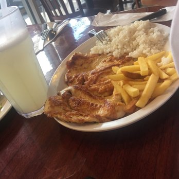 Ruta 75 - Grilled chicken, fries and rice. I kept the tostones ! - Colombian Near Me - Hialeah, Florida