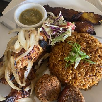 Gold Coast Ghal Kitchen - Jollof Rice w/ Afra Chicken Fried Plantains - African Near Me - Seattle, Washington Gold Coast Ghal Kitchen - Jollof Rice w/ Afra Chicken Fried Plantains - African Near Me - Seattle, Washington
