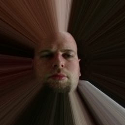 a man with his eyes closed