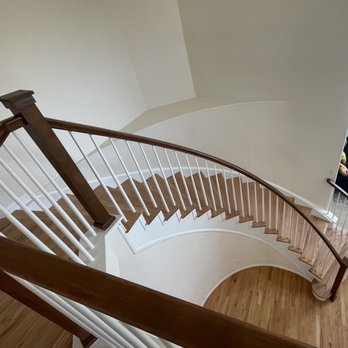 New Horizons Flooring Company - New Horizons installed hardwood on the curved stairs. - Flooring Near Me